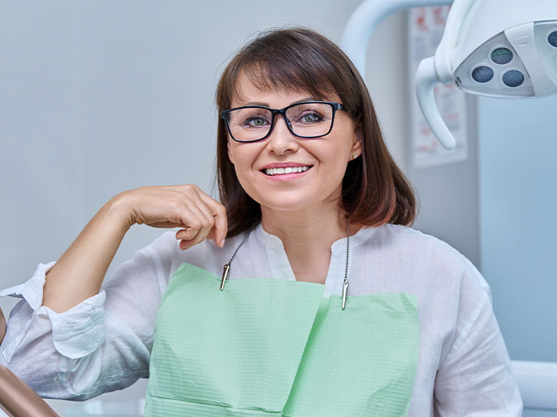 dentist holding a tooth