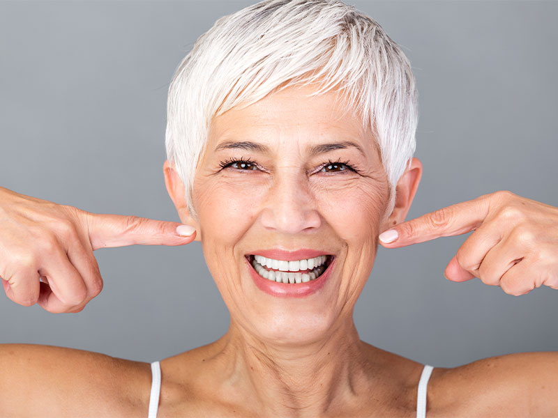 elderly couple smiling